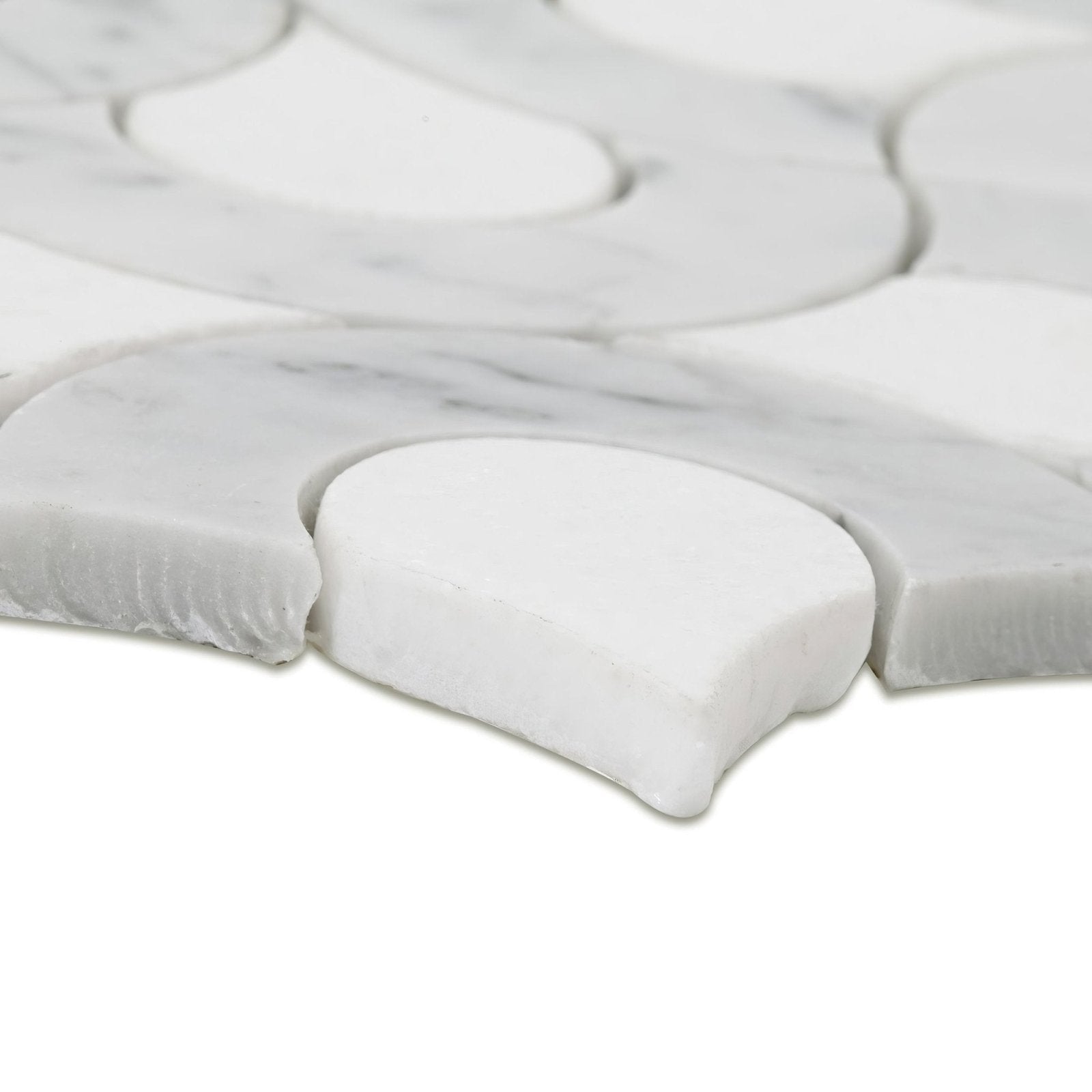 High society marble guggenheim white marble mosaic tiles with subtle gray veining in a scalloped organic pattern