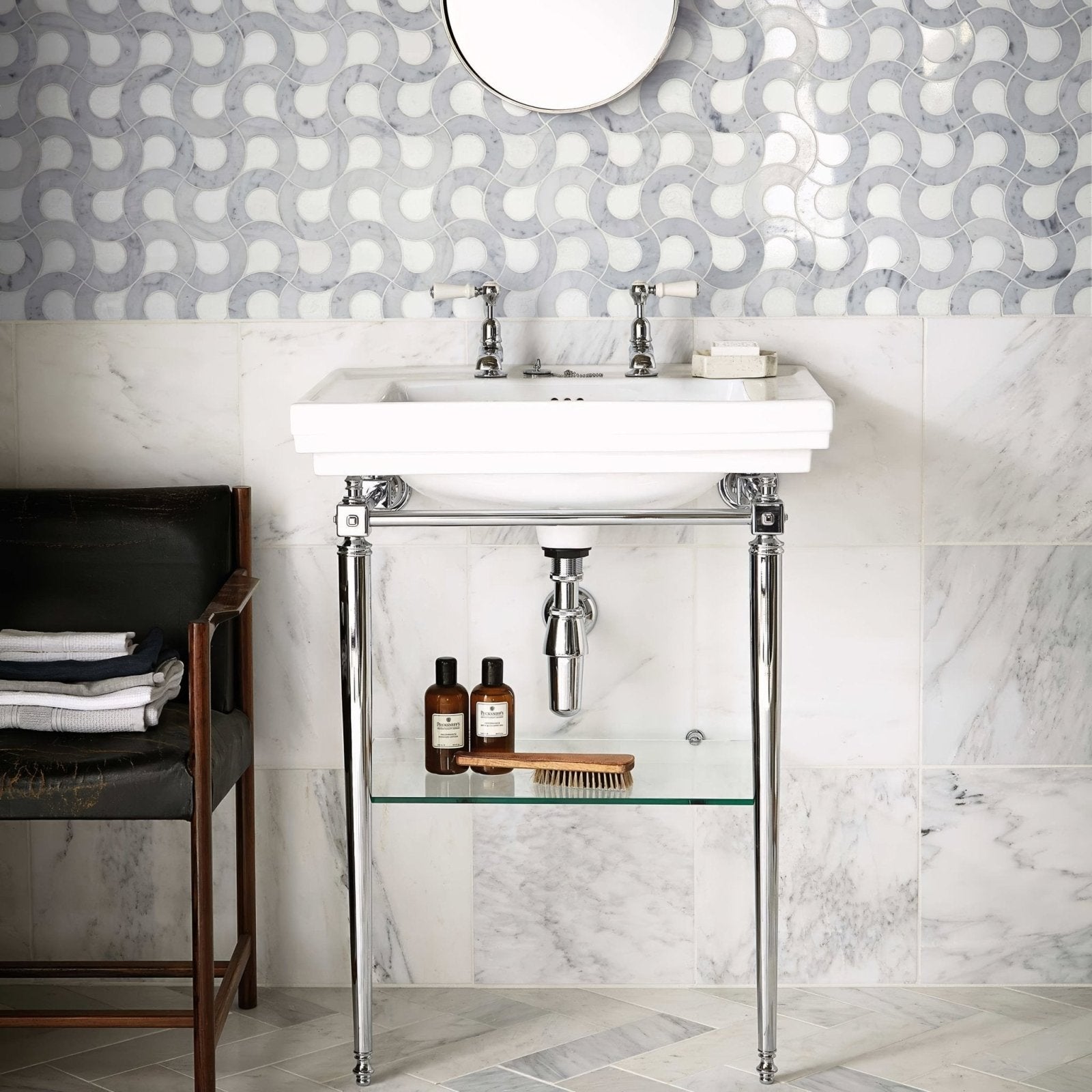 High Society Marble Guggenheim white ceramic pedestal sink with chrome legs and glass shelf for bathroom use