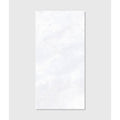A sleek rectangular white marble Himalaya porcelain matt crystal tile with subtle veining and a glossy finish