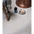 Beige marble-effect himalaya porcelain matt natural bathroom tile with subtle veining and smooth glossy finish