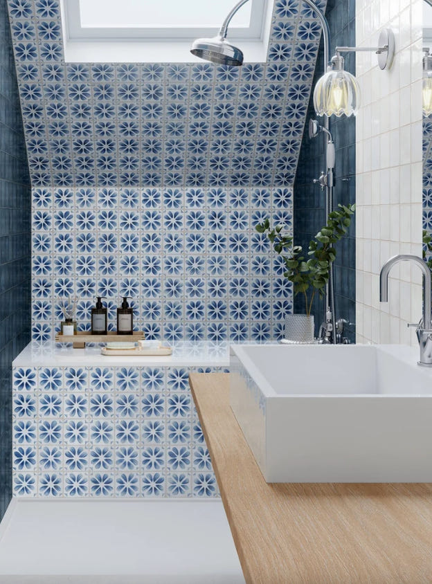 Dakota Flora Ice blue and white floral porcelain wall tiles around a shower and basin