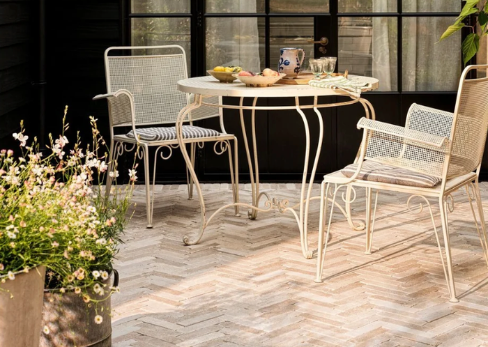 Dijon tumbled limestone cobbles on a sunlit outdoor terrace