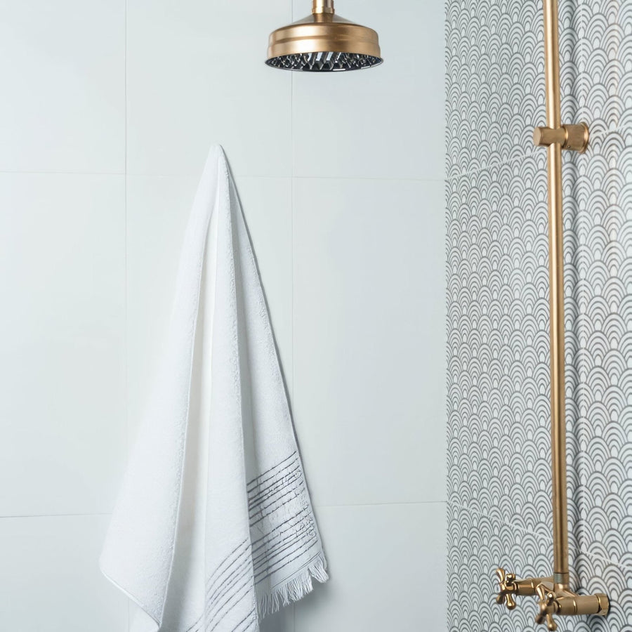 Ice White Rectified Ceramic 60x30 in a bathroom setting