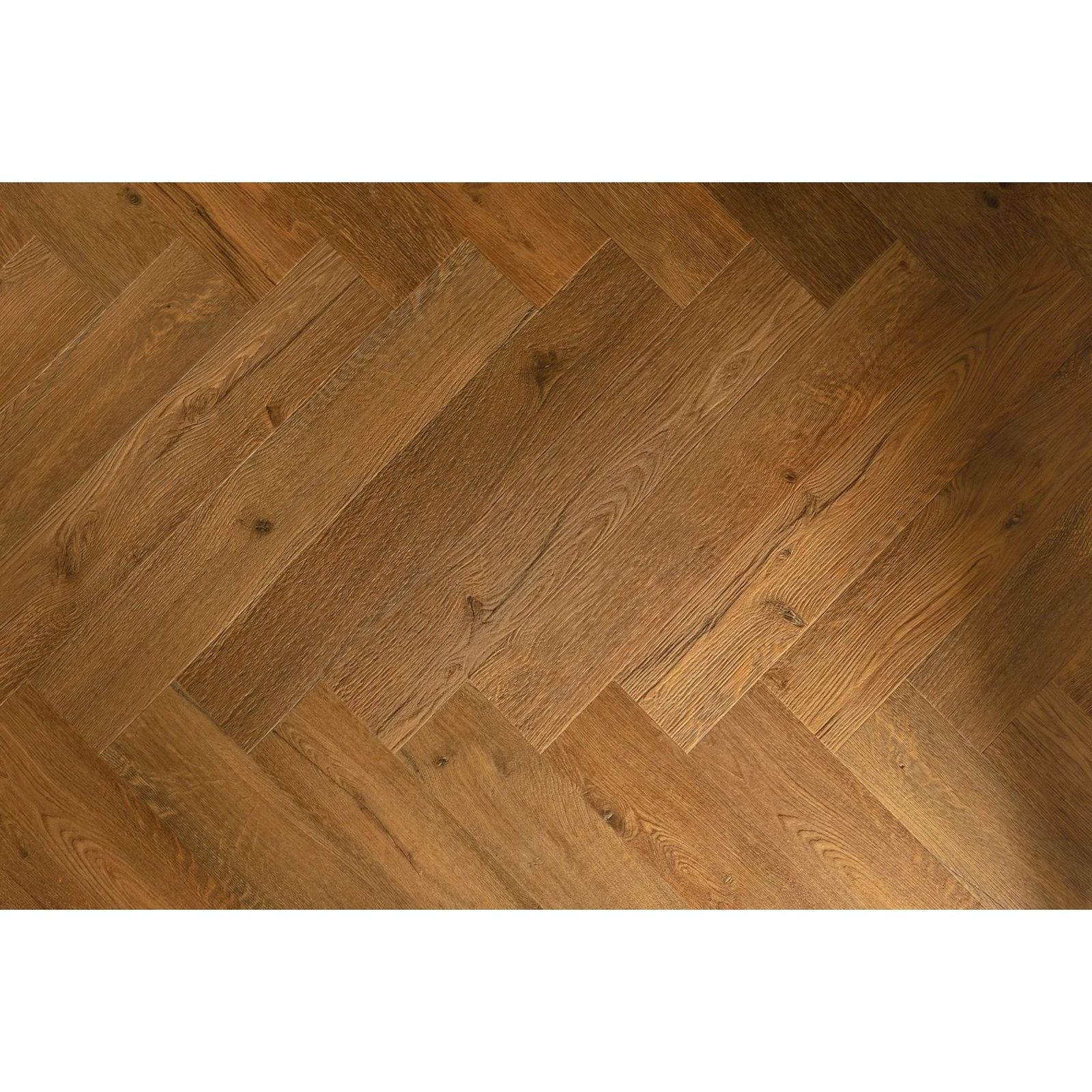 Warm-toned oak vinyl flooring in classic herringbone pattern from ikura f333 collection