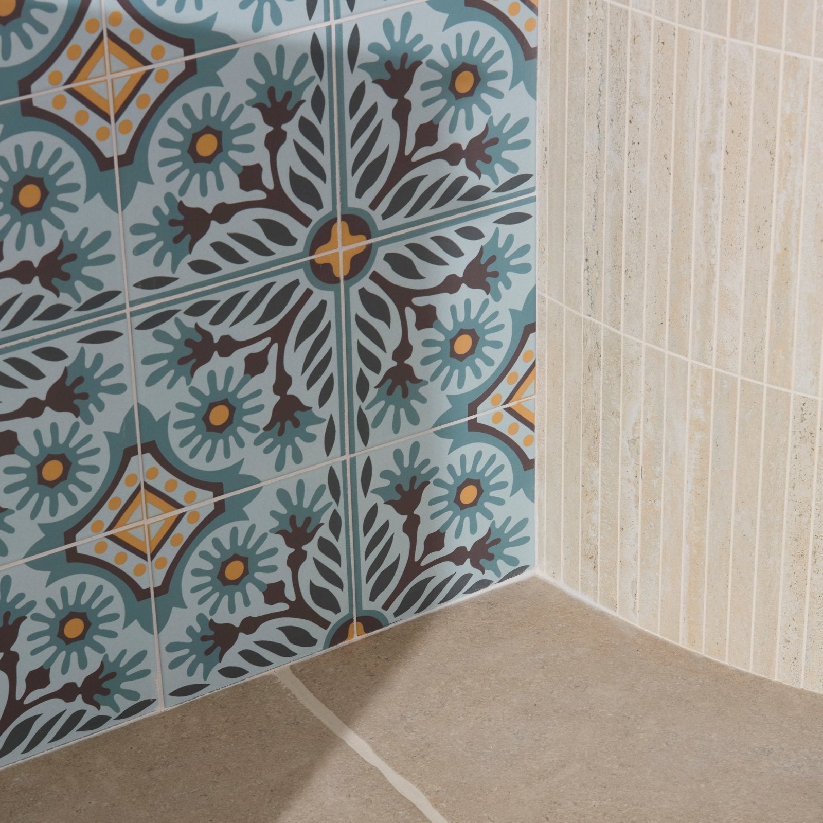Indirah porcelain azure 20 x 20cm blue and brown patterned ceramic tiles with yellow accents in a bathroom corner