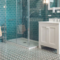 White vanity cabinet with silver hardware and round knobs featuring infusion amparo patterned tile design