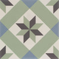 A square ceramic infusion ribeira patterned tile with geometric diamonds in sage green blue and dark gray on off-white