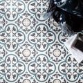 Blue and gray patterned ceramic floor tiles with vintage ornate design from infusion st etienne collection