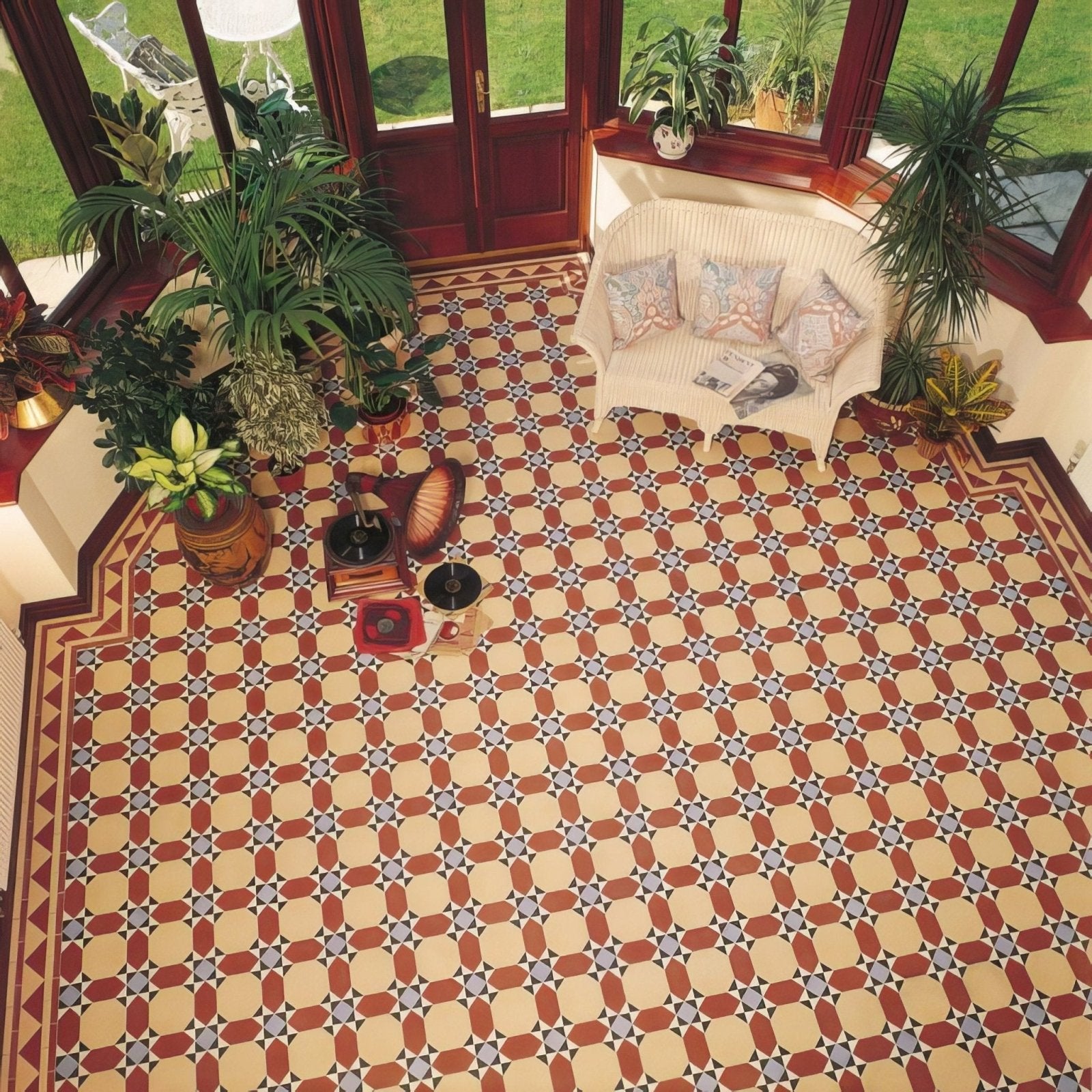Patterned terracotta and cream vinyl floor tiles with geometric design from Inverlochy Blue and Red collection