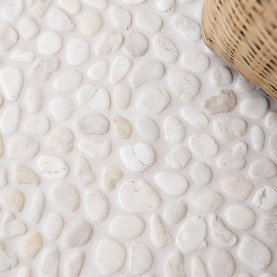 Ivory Samoa pebble mosaics with white smooth rounded stones in off-white and light gray for decorative tiling