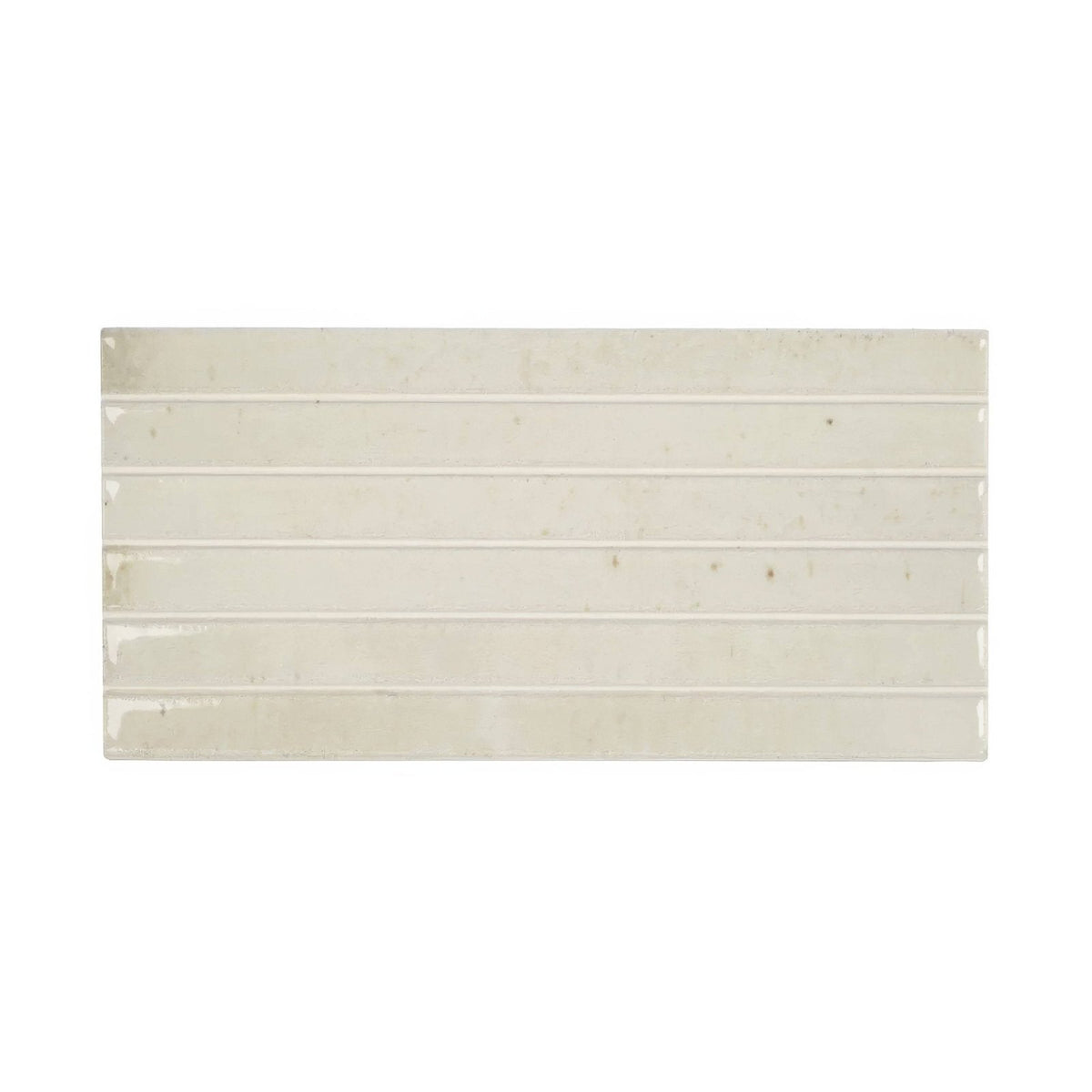 Cream-colored ixworth bone bar tile ceramic rectangular tile with horizontal grooves and subtle glossy finish