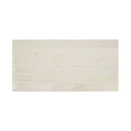 Cream-colored rectangular ixworth bone bar tile with horizontal grooves and subtle marbled texture for wall use