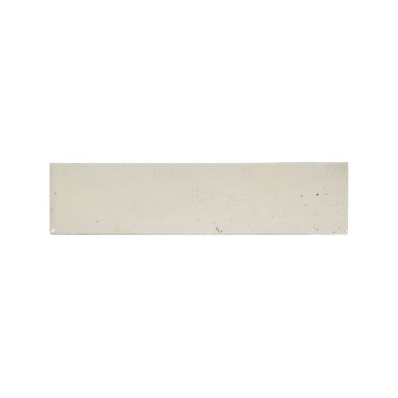 Cream-colored rectangular ceramic ixworth bone brick tile with subtle speckled texture for wall and floor use