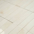 Off-white rectangular ceramic floor tile ixworth bone brick tile with subtle natural variations and thin grout lines