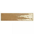 A rectangular earth-toned ceramic ixworth honey brick tile with a distressed finish and subtle white patches