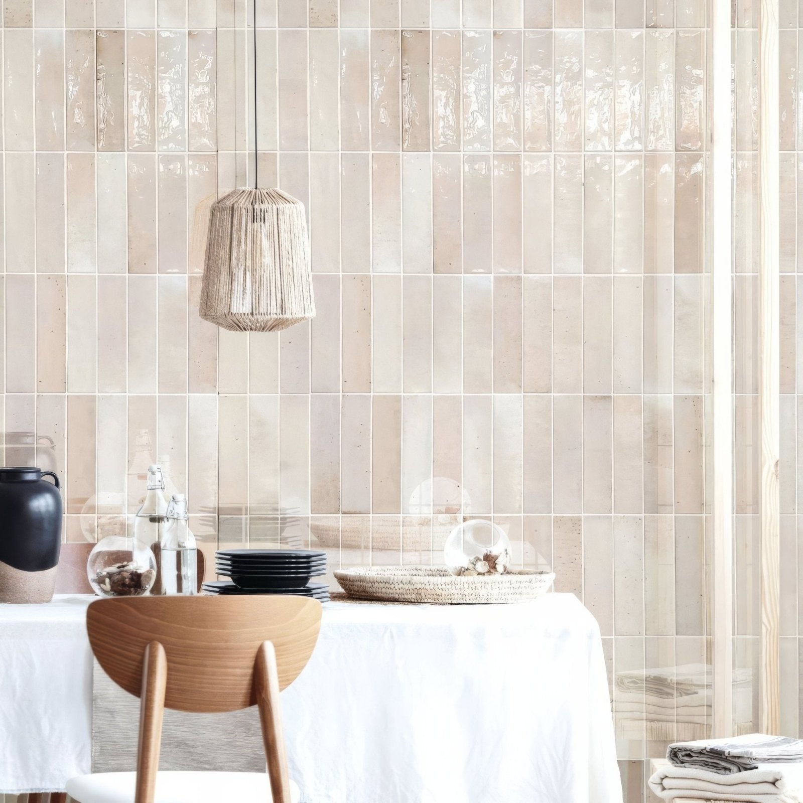 Beige translucent ixworth ivory brick tiles with a subtle textured finish forming a rectangular wall surface