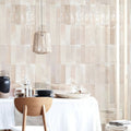 Beige translucent ixworth ivory brick tiles with a subtle textured finish forming a rectangular wall surface