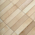 Beige ixworth ivory brick tile with subtle natural stone texture arranged in a diagonal rectangular pattern