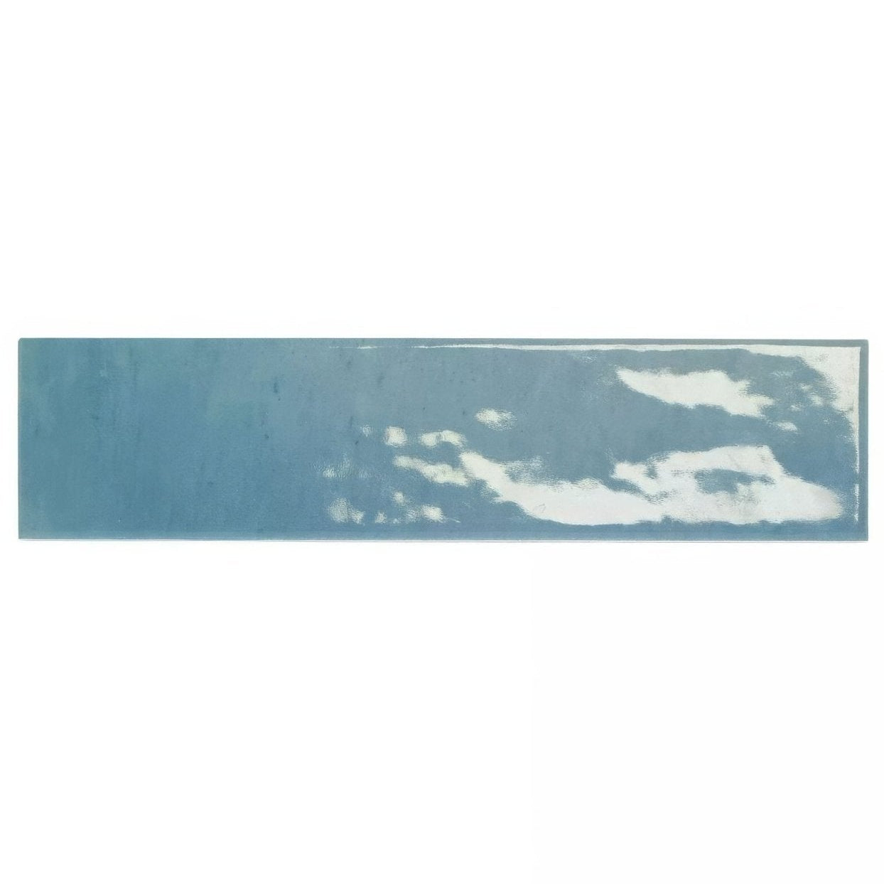 A rectangular blue ceramic ixworth sky brick tile with a distressed weathered finish and subtle white streaks