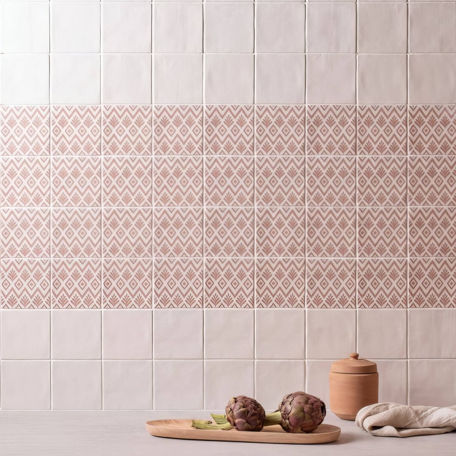 Jacquard clay ceramic tiles with off-white upper squares and pinkish-beige lower tiles featuring geometric patterns