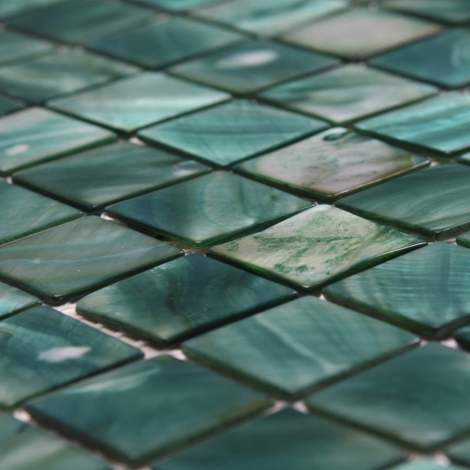 Jade 25mm square teal and green marbled mosaic tiles with a glossy natural stone finish for decorative surfaces