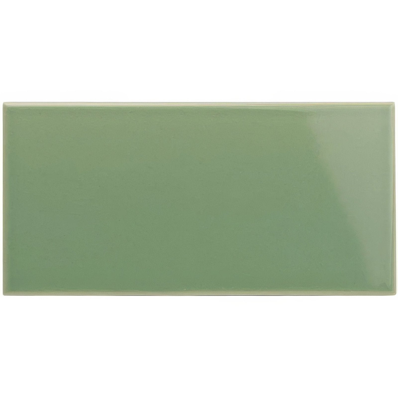 A sleek glossy sage green rectangular ceramic tile with a smooth surface and subtle reflective sheen jade breeze half tile