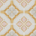 Vintage-style ceramic jaipur akola patterned tile with repeating quatrefoil pattern in soft gold pale pink and muted gray