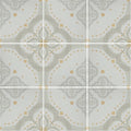 Gray and gold patterned ceramic floor tile with intricate geometric designs from jaipur barmer collection
