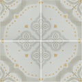 Jaipur barmer patterned tile featuring gray and gold ornate ceramic floor tiles with symmetrical design