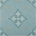 A square ceramic jaipur dabu patterned tile with a light blue background and white dark teal floral motifs with yellow accents