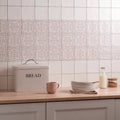 Jaipur Dahlia cream-colored metal bread box with a black bread label and silver handle for kitchen storage