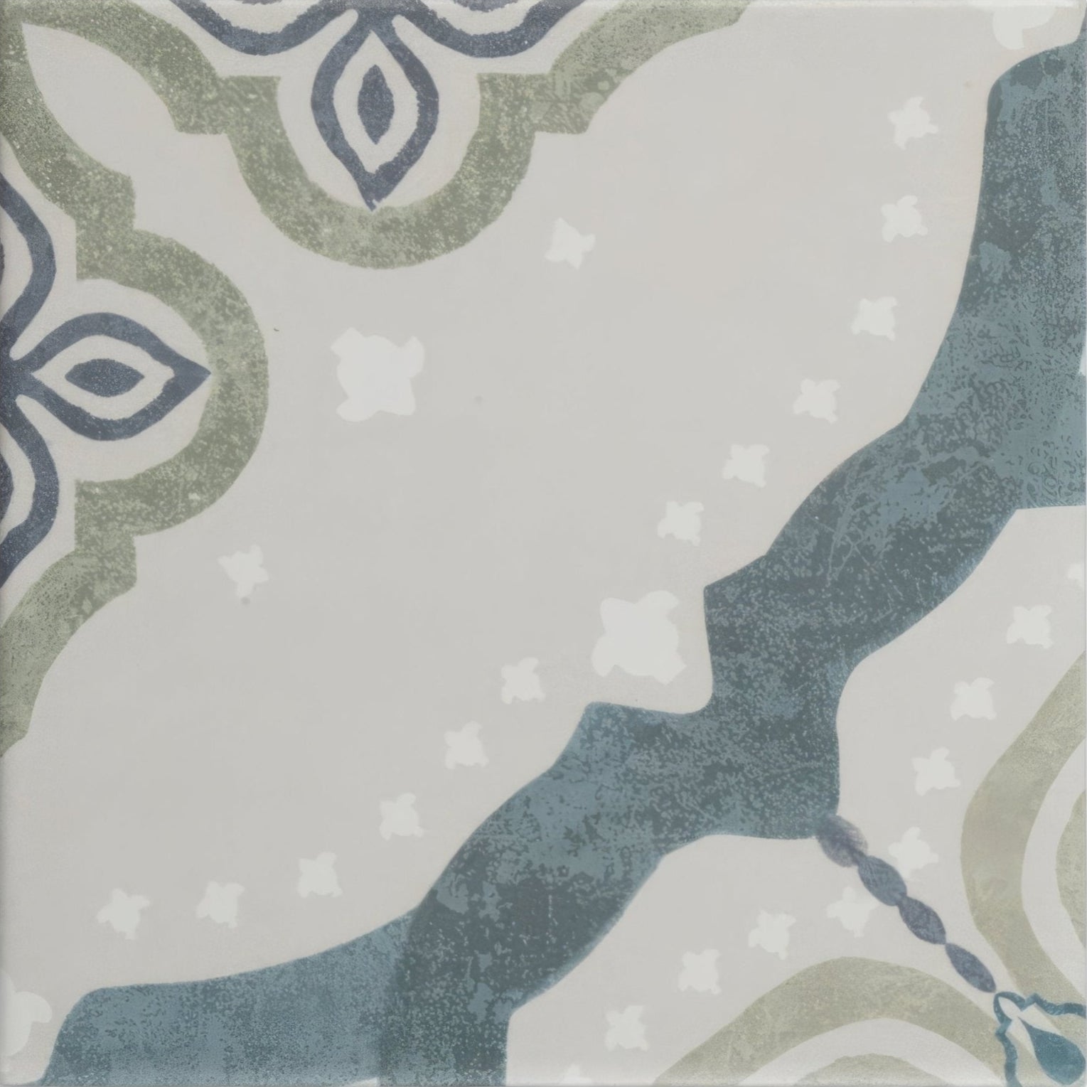 A square Jaipur Deesar patterned ceramic tile with a distressed vintage design in blue gray and olive green on light gray