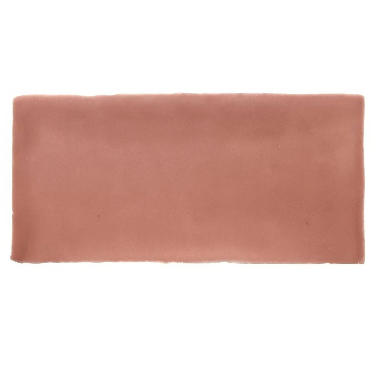 A rectangular terracotta-colored ceramic tile with a smooth matte finish named jaipur pompeiian red rectangle glazed tile