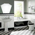 Black and white clawfoot bathtub with chrome fixtures featuring jet black omega moulding design
