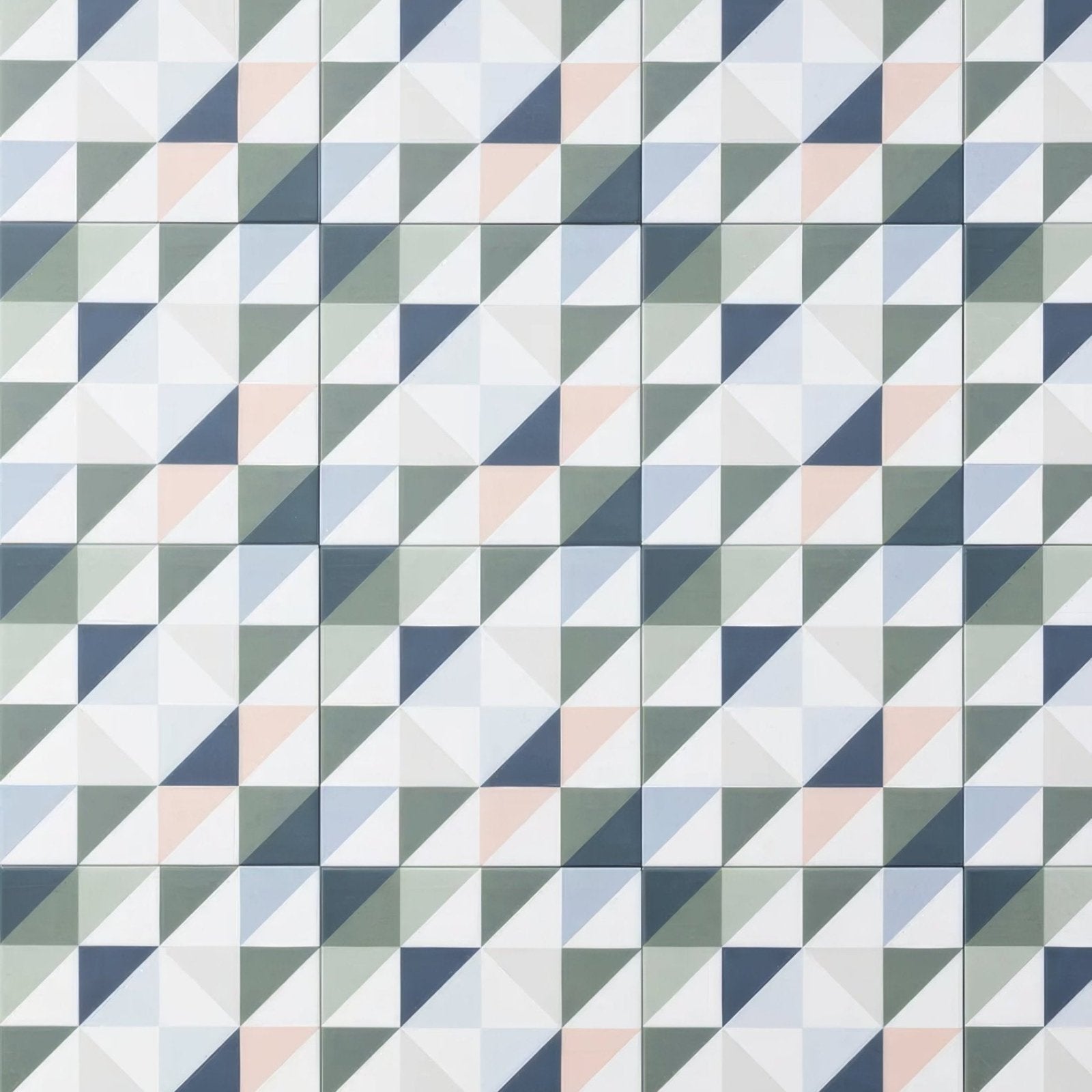 Kaleidoscope porcelain skipper geometric patterned tiles with interlocking white pink blue gray and navy triangles