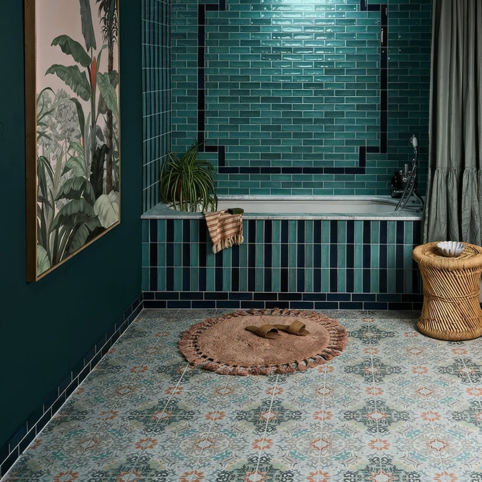 Teal-green porcelain subway tile wall with black accent trim from kashmir earthern collection