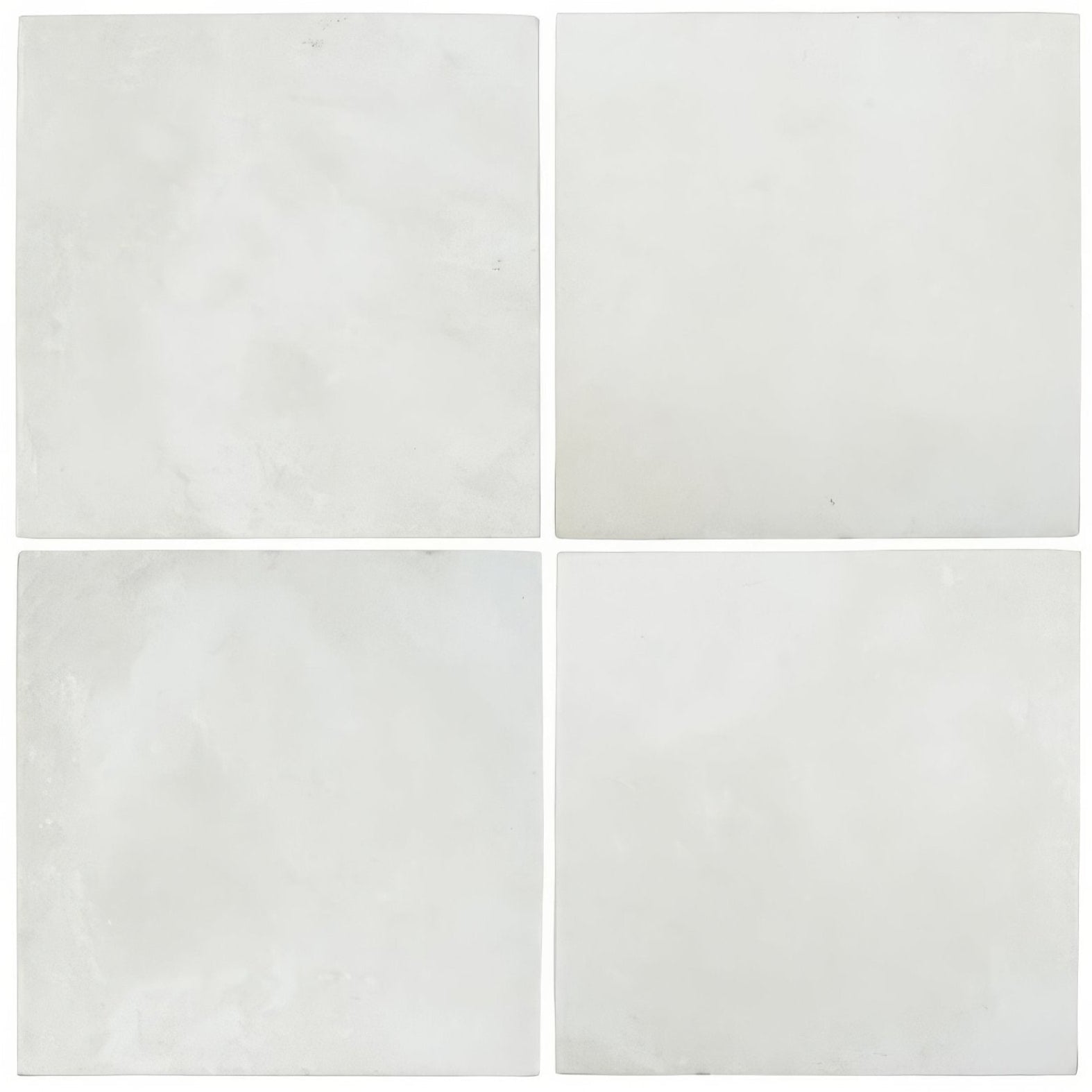 Four kelmscott antique white ceramic tiles with subtle gray veining arranged in a square grid pattern