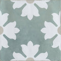 Kelmscott coleton blue patterned square ceramic tile with muted sage green background and white floral accents