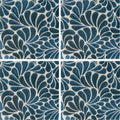 Kelmscott emery blue patterned tile featuring blue and white ceramic with a repeating leaf pattern