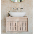 White ceramic vessel sink mounted on light wood vanity with vertical slat doors kelmscott lytes terra tile