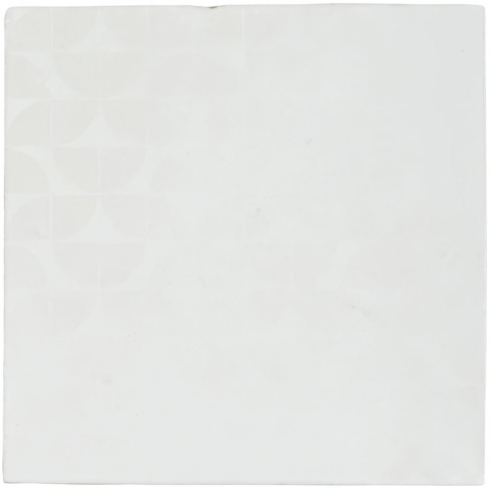 White ceramic tile kelmscott lytes with a subtle geometric pattern ideal for wall and floor applications