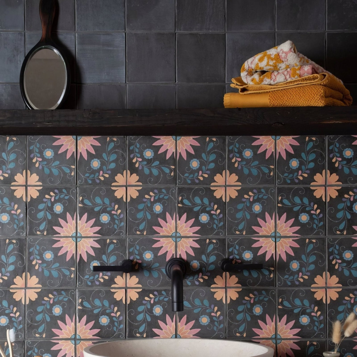 Dark gray ceramic kelmscott slate black tiles with pink peach and teal floral pattern for bathroom walls