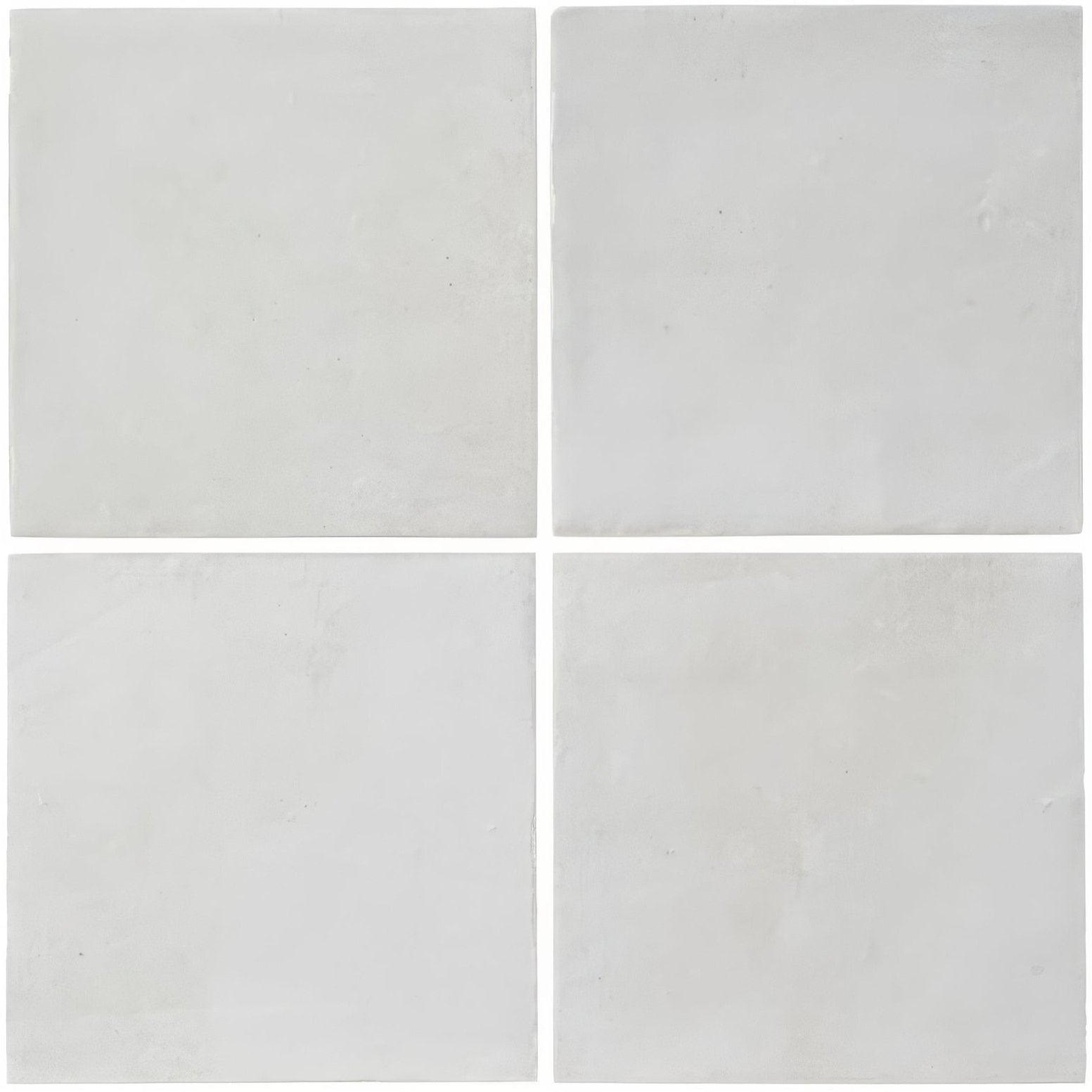Four square matte finished light gray ceramic tiles arranged in a grid from the kelmscott white tile collection
