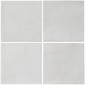 Four square matte finished light gray ceramic tiles arranged in a grid from the kelmscott white tile collection