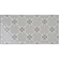 Gray rectangular tile kew on dunwich with a repeating pattern of white and dark gray snowflake motifs