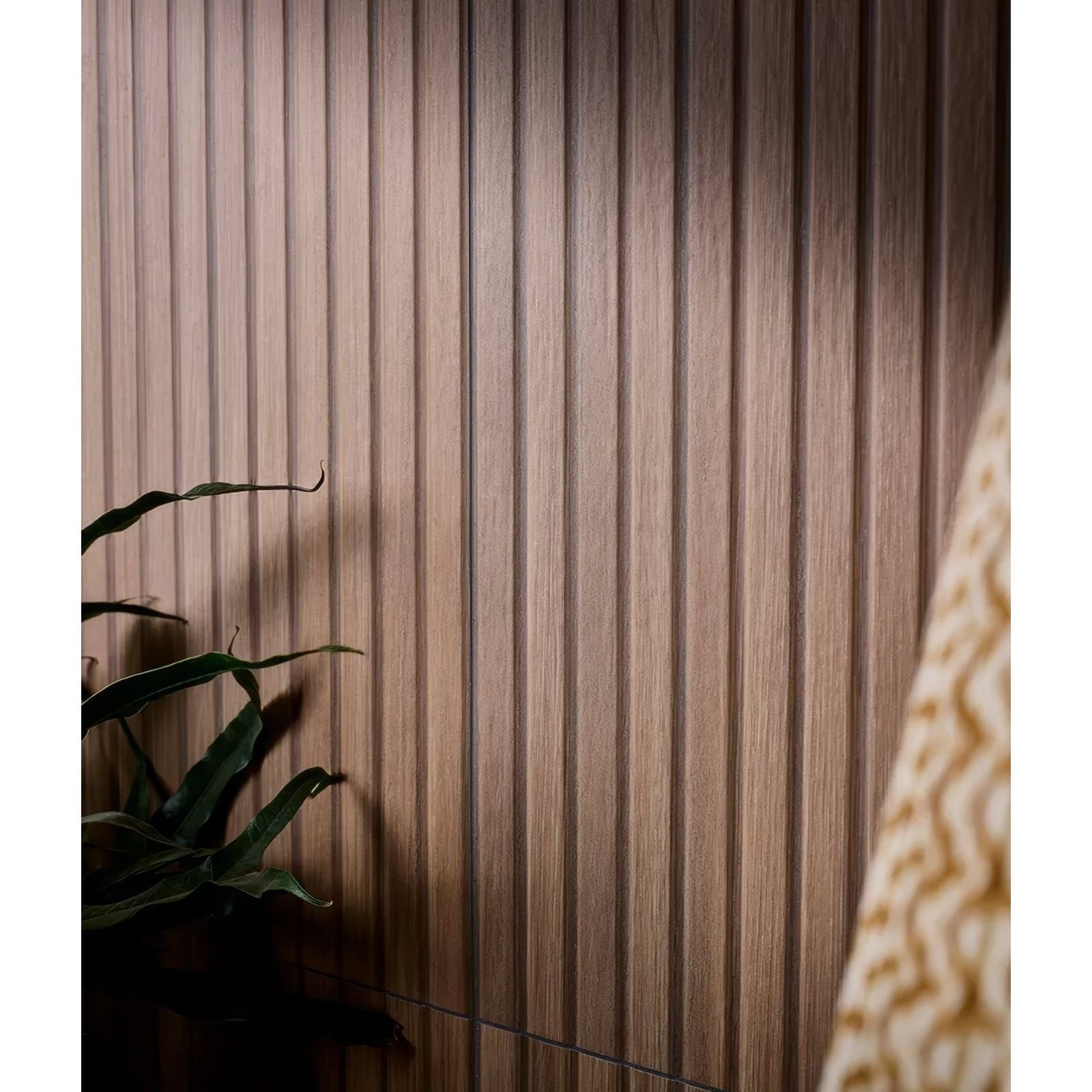 Warm-toned vertical wood paneling with subtle grain texture on kinfolk porcelain nut wall panel design