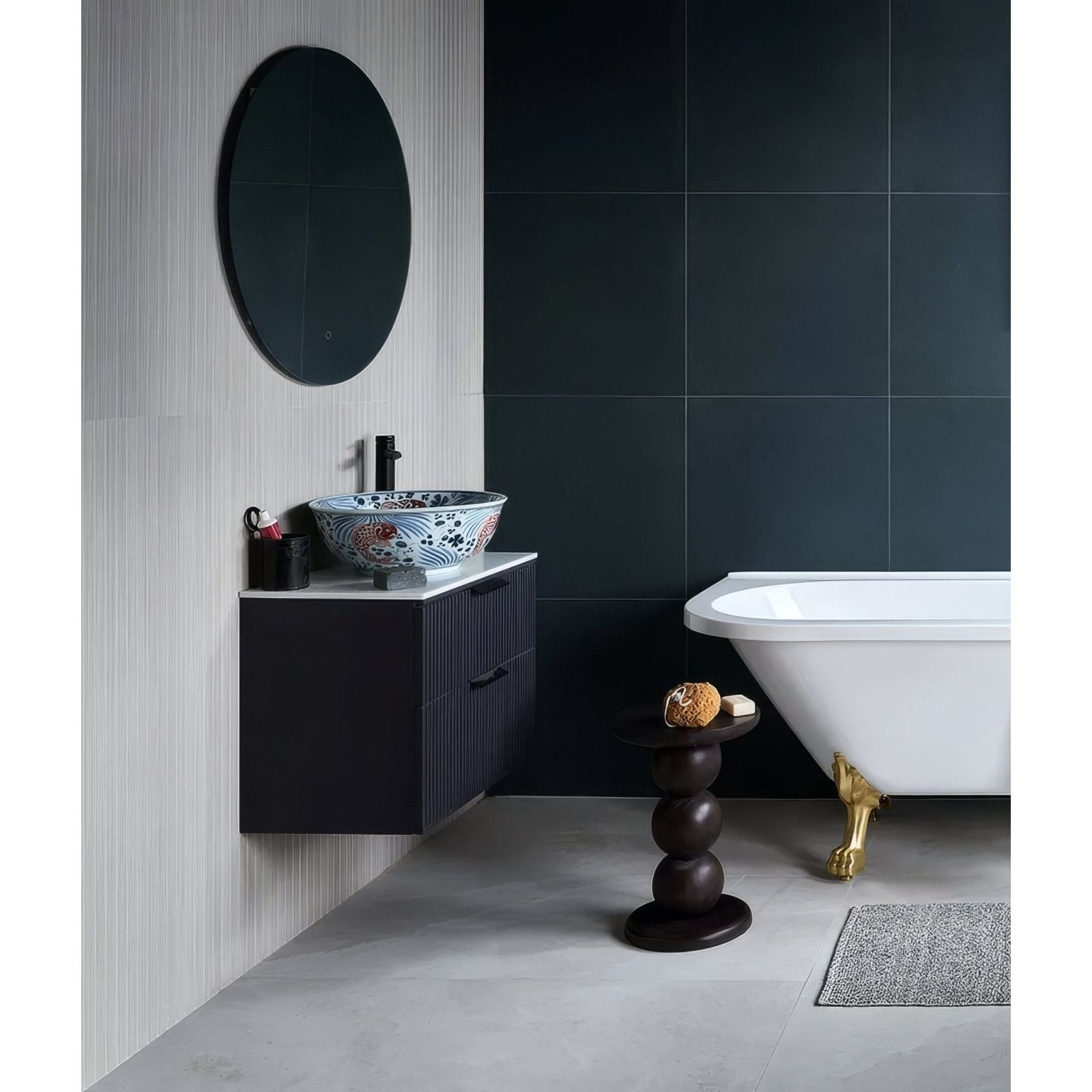 Kinfolk porcelain white blue and white patterned ceramic bowl sink with black faucet on dark gray vanity