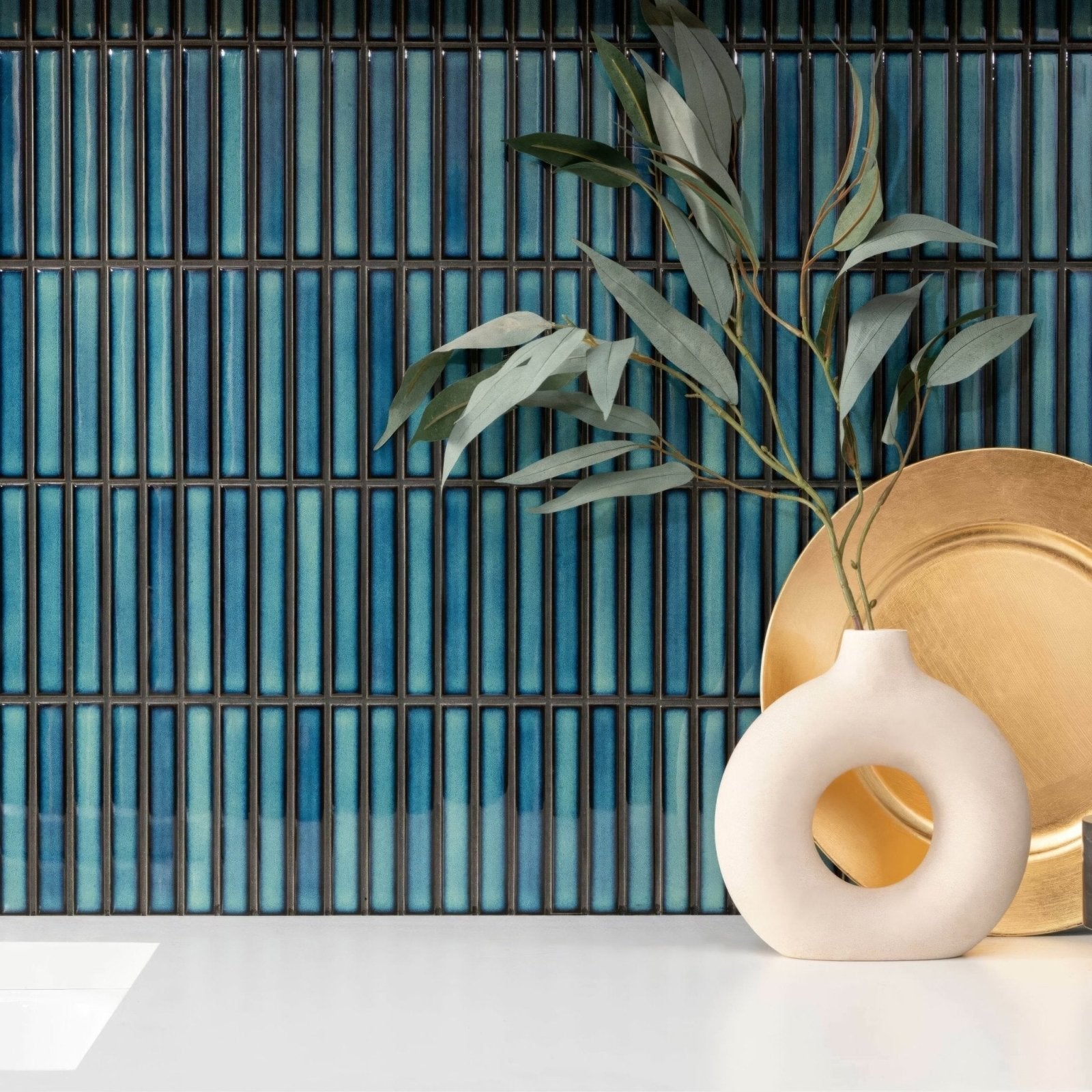 Cream-colored ceramic vase with a distinctive circular hole in its center from the Kitkat Blue Two Tone Mosaic collection