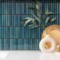 Kitkat Blue Two Tone Mosaic blue ceramic mosaic with a cream ceramic vase