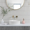 Kitkat White Mosaic white ceramic mosaic with a white vessel sink and smooth rounded edges